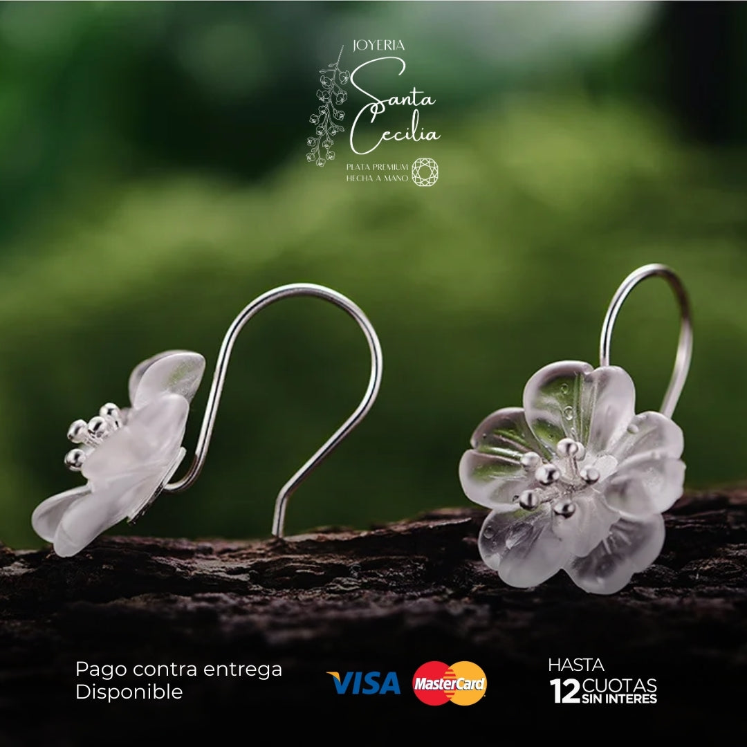 Aretes Flores bajo la lluvia